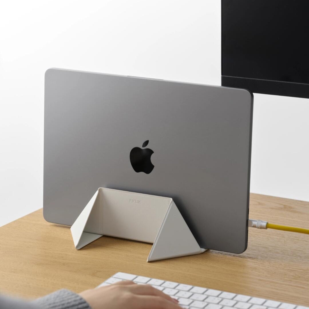 Foldable laptop stand on a desk workspace