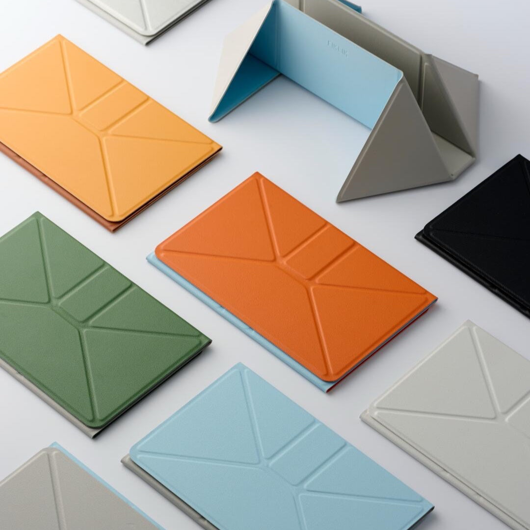 Foldable laptop stand shown in six color options